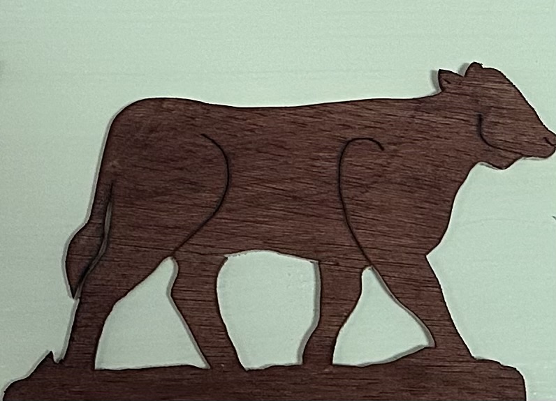 Wooden cow scroll-saw cutout